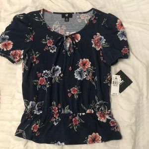 navy shirt with flowers and synched bottom